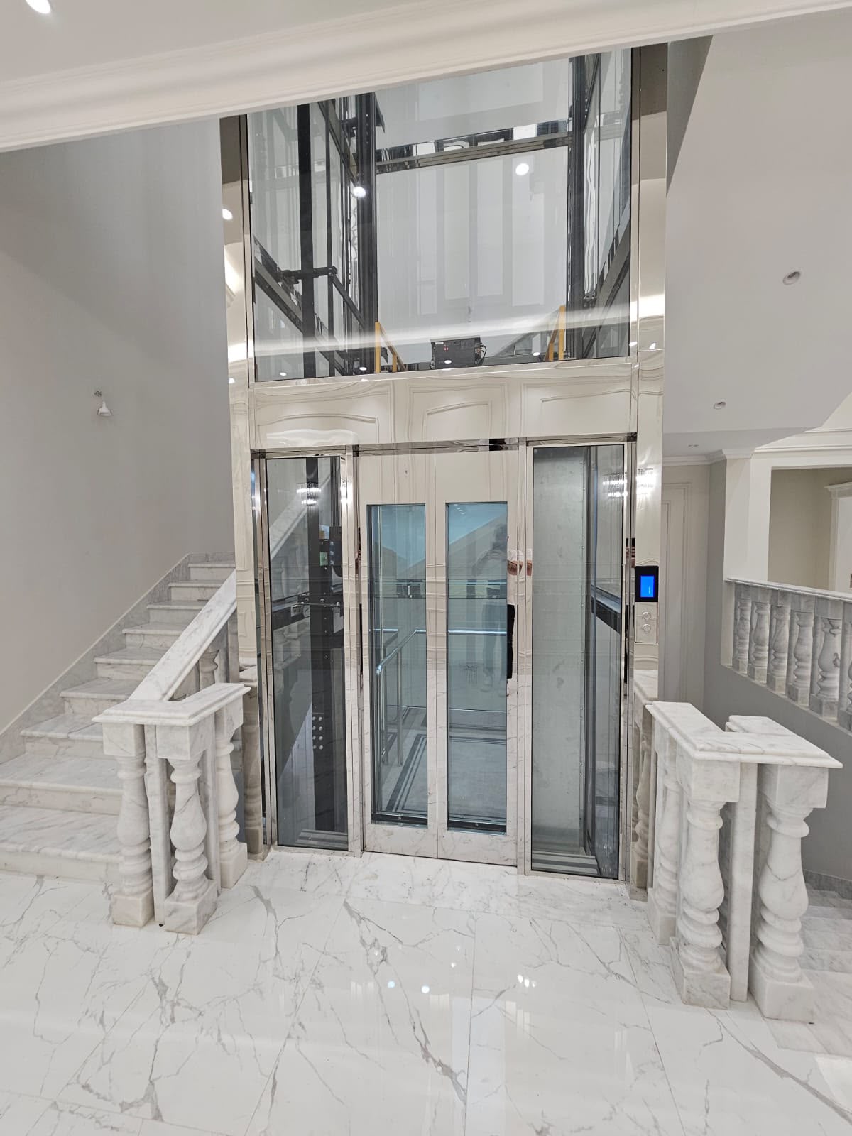 Panoramic glass elevator installation - private villa
